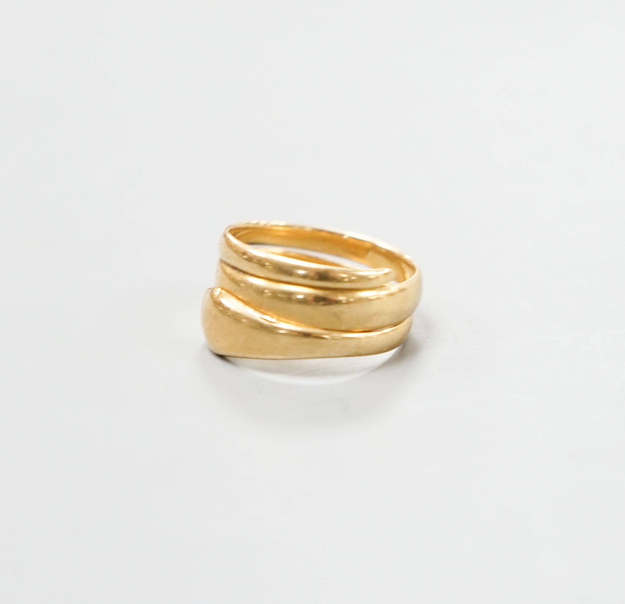 A late Victorian 18ct gold 'serpent' ring, hallmarked for Birmingham, 1876, size R/S, 8.5 grams.